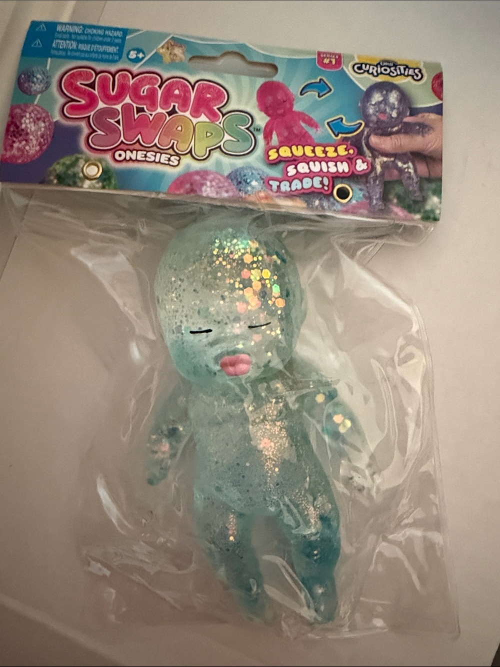 Onesies Blue Glitter Squeeze Toy - Kids